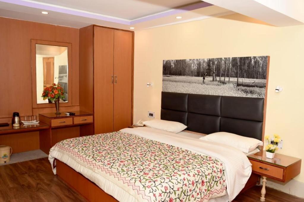 Postel nebo postele na pokoji v ubytování Hotel Centre Point