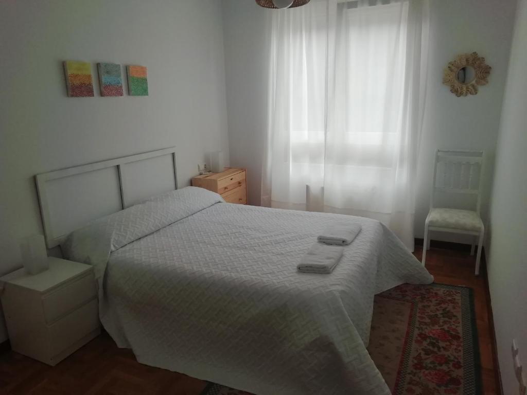 Postel nebo postele na pokoji v ubytování Apartamento Conlledo