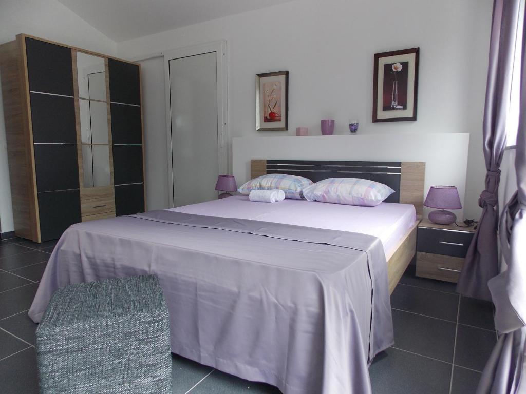 Кровать или кровати в номере Apartments Villa PM