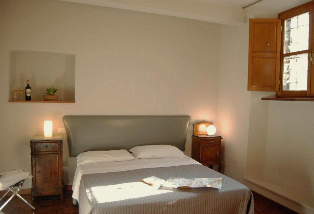 Postel nebo postele na pokoji v ubytování Hotel Diana & Depandance
