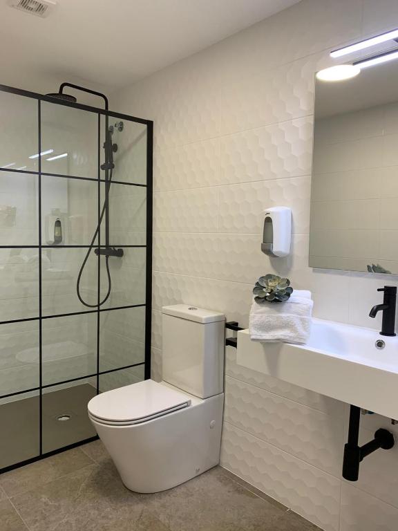 Koupelna v ubytování Hostal Comfort Suites