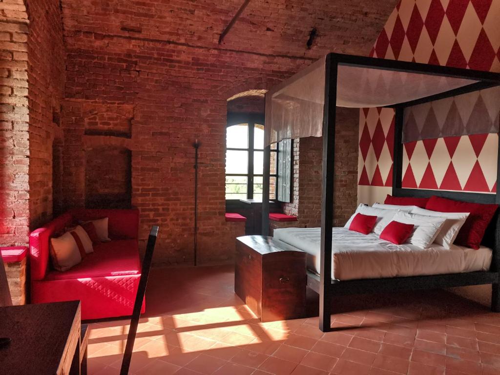 Posteľ alebo postele v izbe v ubytovaní Rocca di Arignano