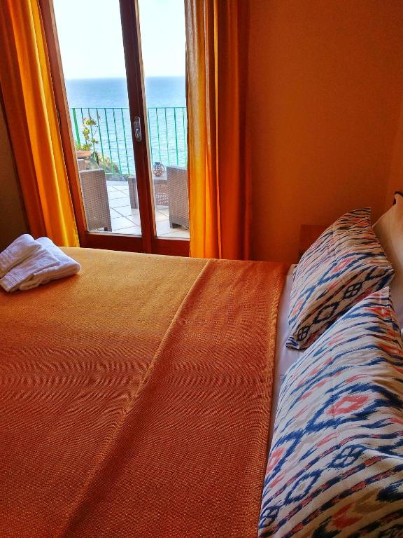 Postel nebo postele na pokoji v ubytování Hotel Desiree
