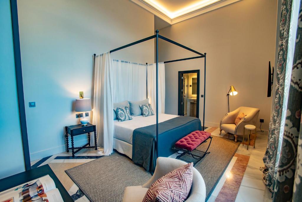 Postel nebo postele na pokoji v ubytování Soho Boutique Castillo de Santa Catalina - Adults Recommended