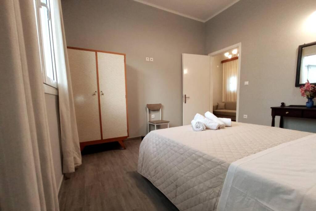Postel nebo postele na pokoji v ubytování Maria's Xenia