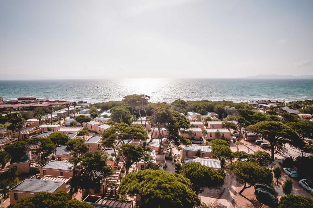 an aerial view of a town next to the ocean at Salines in Hyères