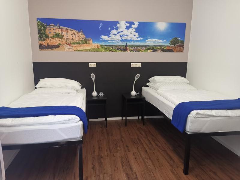 Postel nebo postele na pokoji v ubytování Mar Hotel