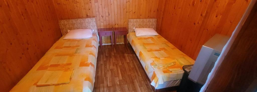 Postel nebo postele na pokoji v ubytování Casa Mihai