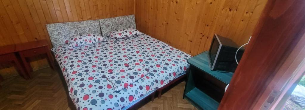 Postel nebo postele na pokoji v ubytování Casa Mihai