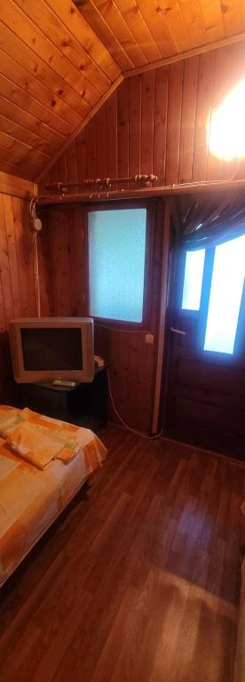 Postel nebo postele na pokoji v ubytování Casa Mihai