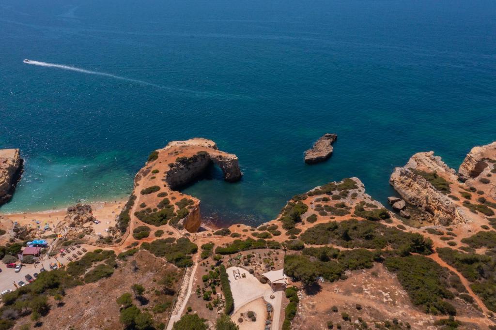 an aerial view of a beach and the ocean at Vila Alba Resort in Carvoeiro
