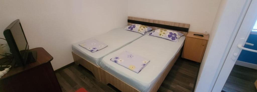 Postel nebo postele na pokoji v ubytování Casa Mihai