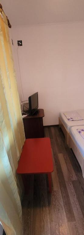 Postel nebo postele na pokoji v ubytování Casa Mihai