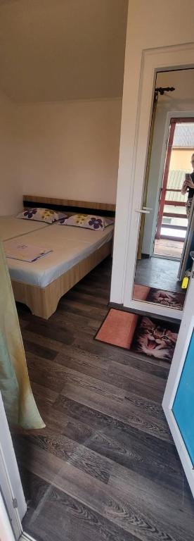 Postel nebo postele na pokoji v ubytování Casa Mihai