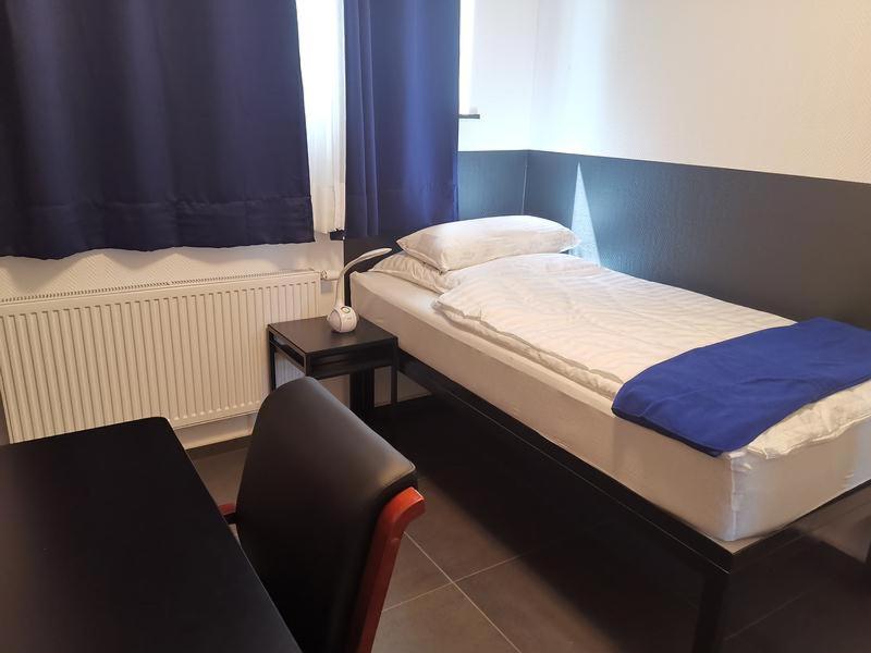 Postel nebo postele na pokoji v ubytování Mar Hotel