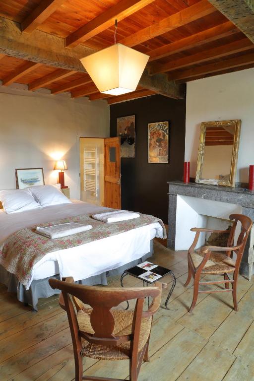 Postel nebo postele na pokoji v ubytování La Maison de Louis