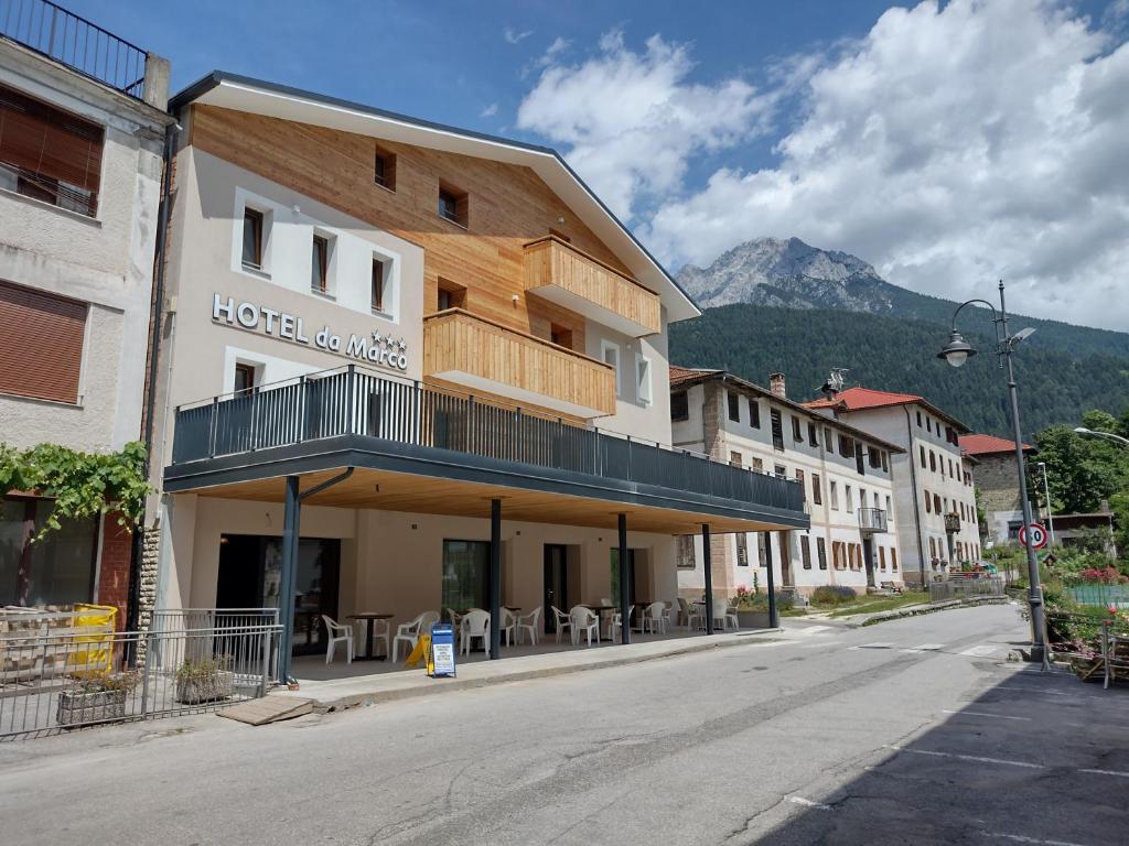 an empty street in a town with a hotel at Hotel Da Marco in Vigo di Cadore