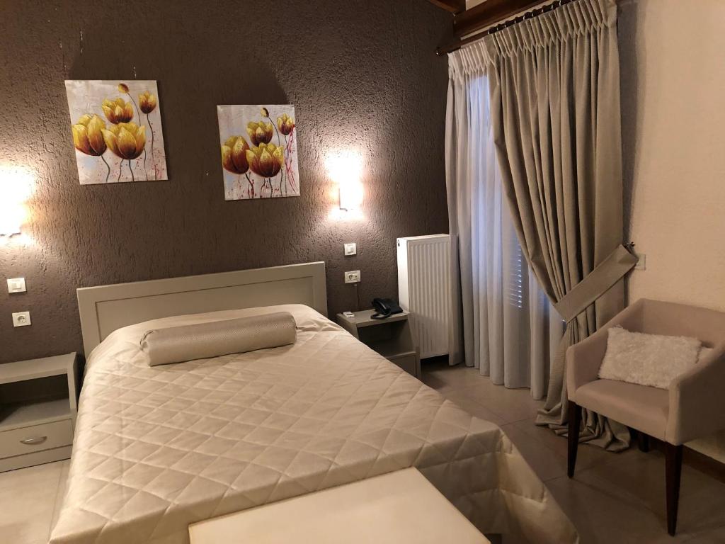 Postel nebo postele na pokoji v ubytování Asimina Guesthouse, Eptalofos Parnassos