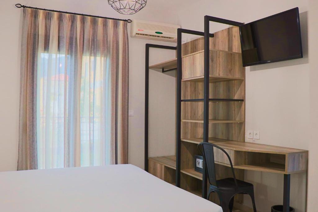 Posteľ alebo postele v izbe v ubytovaní Aliston Hotel Thassos