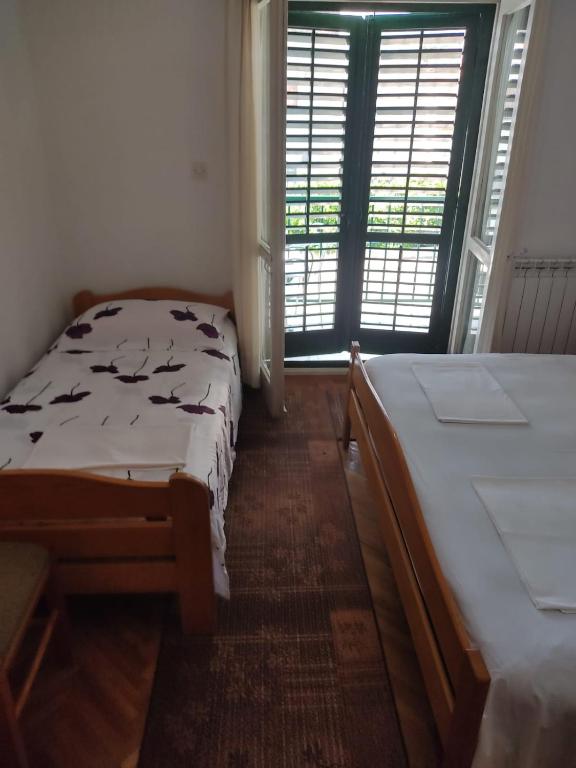 Postel nebo postele na pokoji v ubytování Sobe Zlata