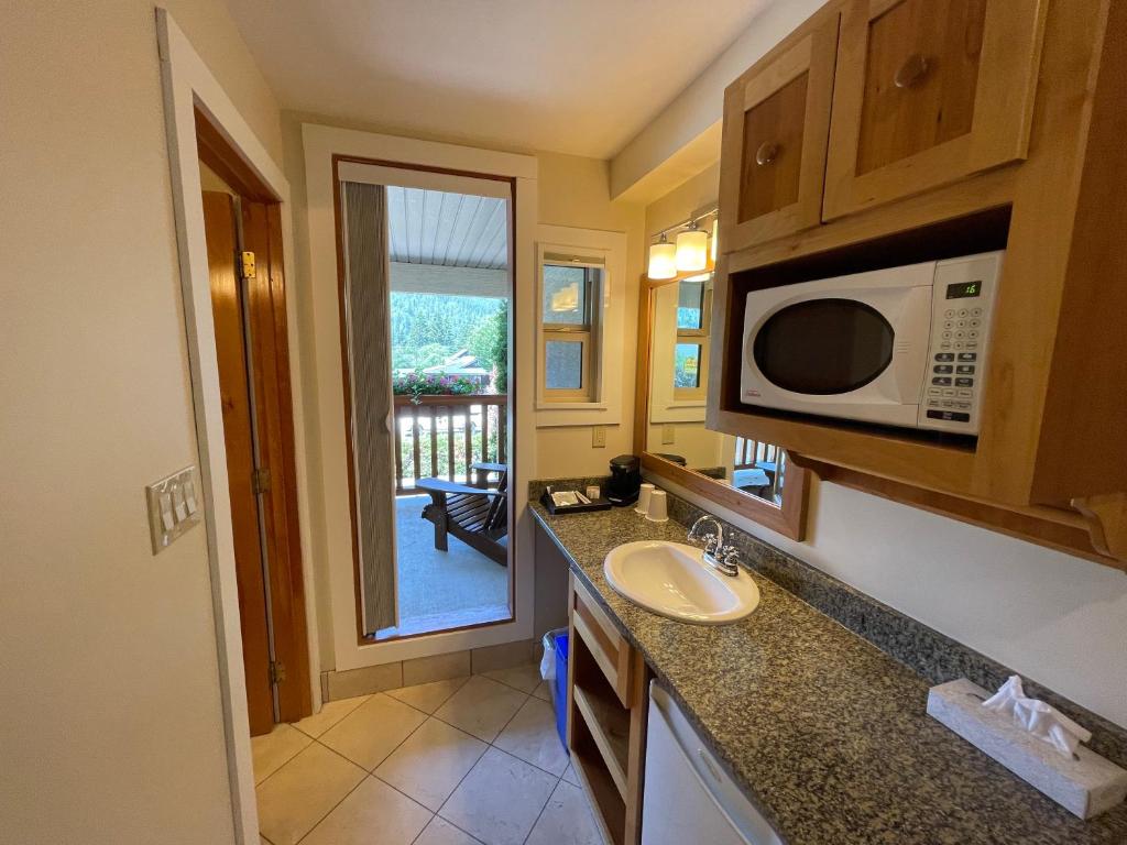 Kuchyň nebo kuchyňský kout v ubytování Park Place Lodge