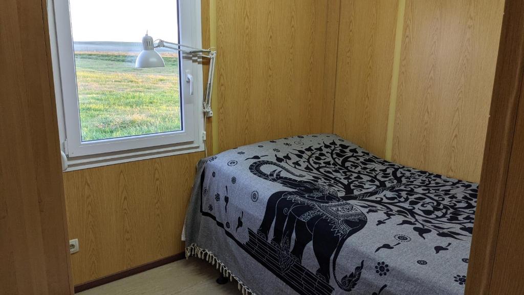 Postel nebo postele na pokoji v ubytování Bjarnastaðir Guesthouse