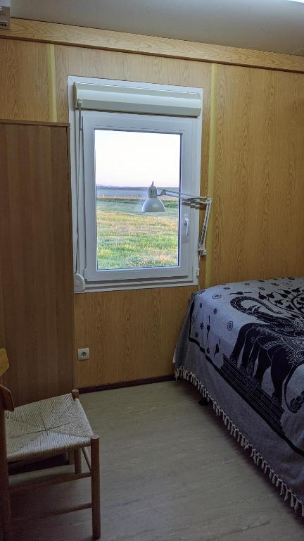 Postel nebo postele na pokoji v ubytování Bjarnastaðir Guesthouse