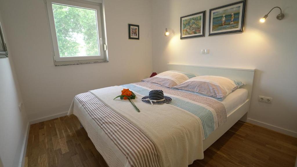 Posteľ alebo postele v izbe v ubytovaní Apartment Lea