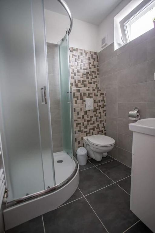 Kúpeľňa v ubytovaní Mona Apartman