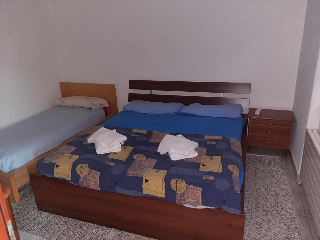 Een bed of bedden in een kamer bij Casa dora