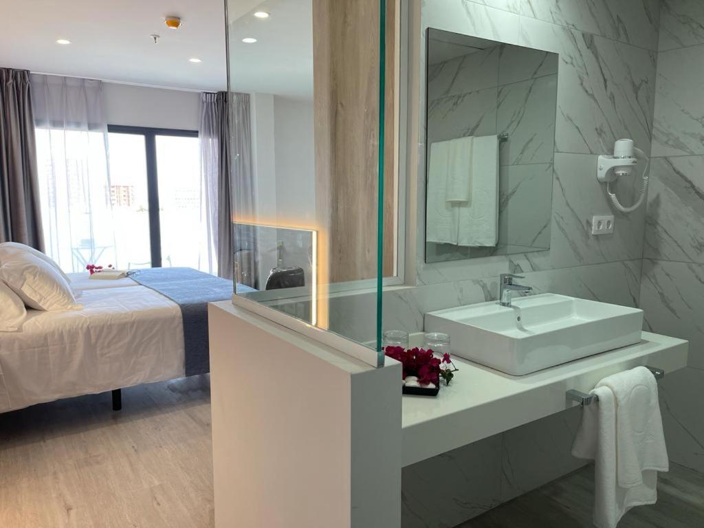 Кровать или кровати в номере Hotel AF Valle Orotava