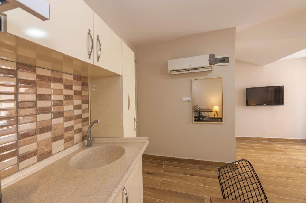 TV a/nebo společenská místnost v ubytování Marida Residence - Istanbul Taksim