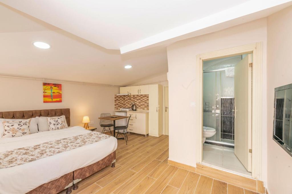 Postel nebo postele na pokoji v ubytování Marida Residence - Istanbul Taksim