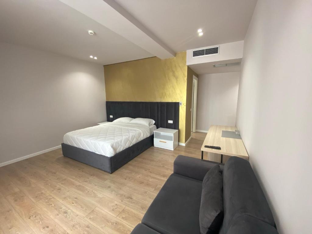 Postel nebo postele na pokoji v ubytování Hotel Alion