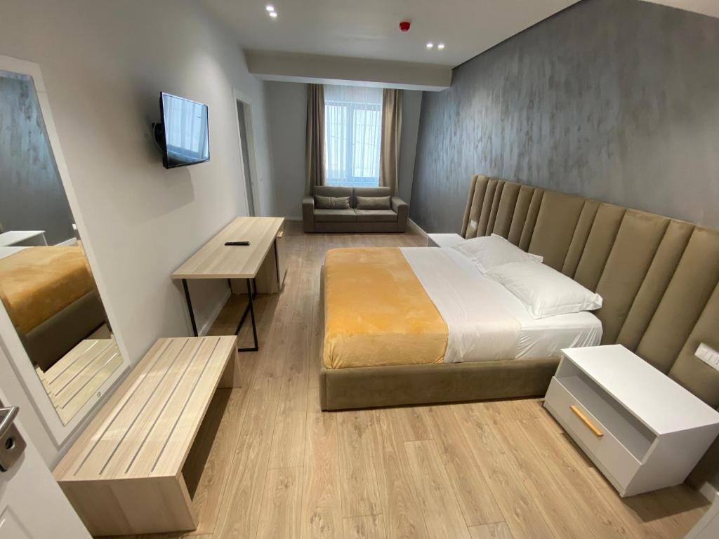 Postel nebo postele na pokoji v ubytování Hotel Alion
