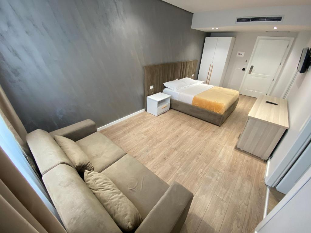 Postel nebo postele na pokoji v ubytování Hotel Alion