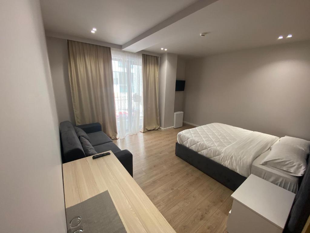 Postel nebo postele na pokoji v ubytování Hotel Alion