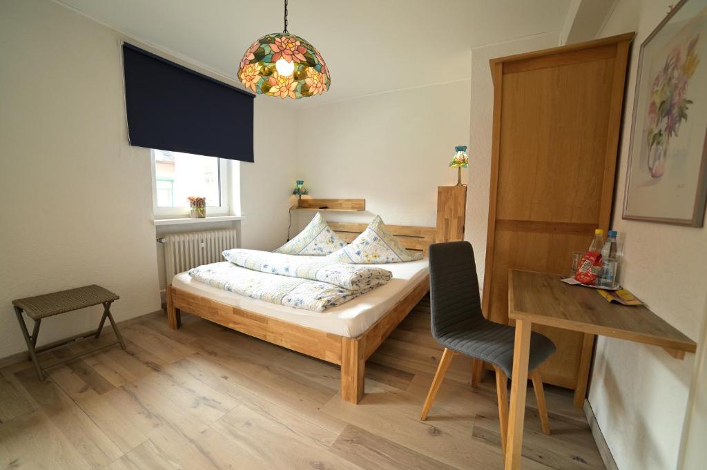 Postel nebo postele na pokoji v ubytování Hotel Zrenners GARNI