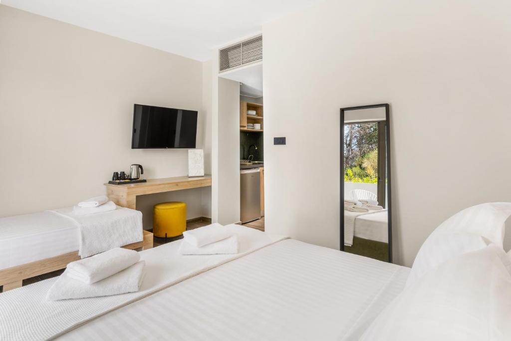 Posteľ alebo postele v izbe v ubytovaní Sigma Luxury Rooms