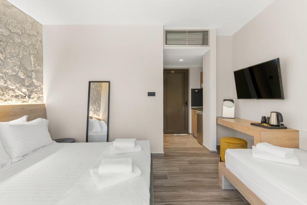 Posteľ alebo postele v izbe v ubytovaní Sigma Luxury Rooms
