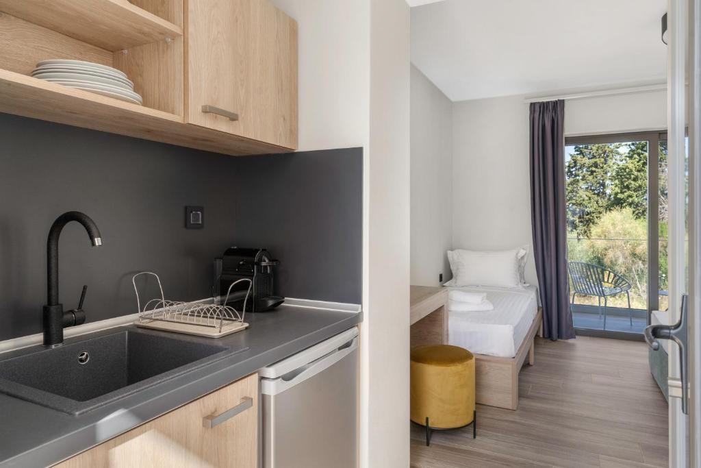 Kuchyňa alebo kuchynka v ubytovaní Sigma Luxury Rooms
