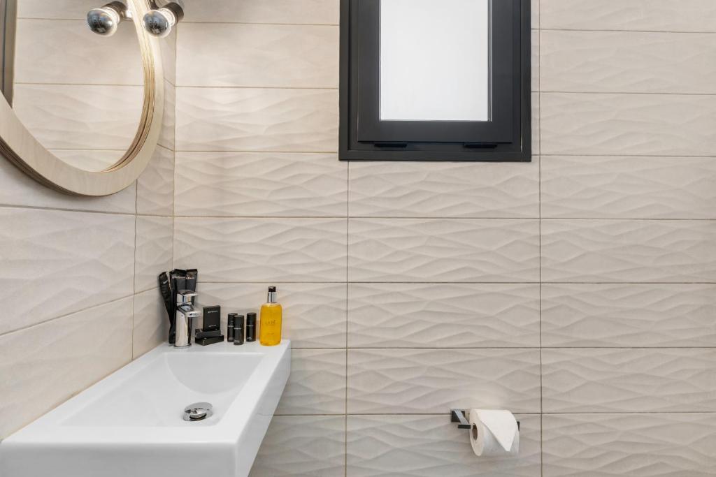 Kúpeľňa v ubytovaní Sigma Luxury Rooms