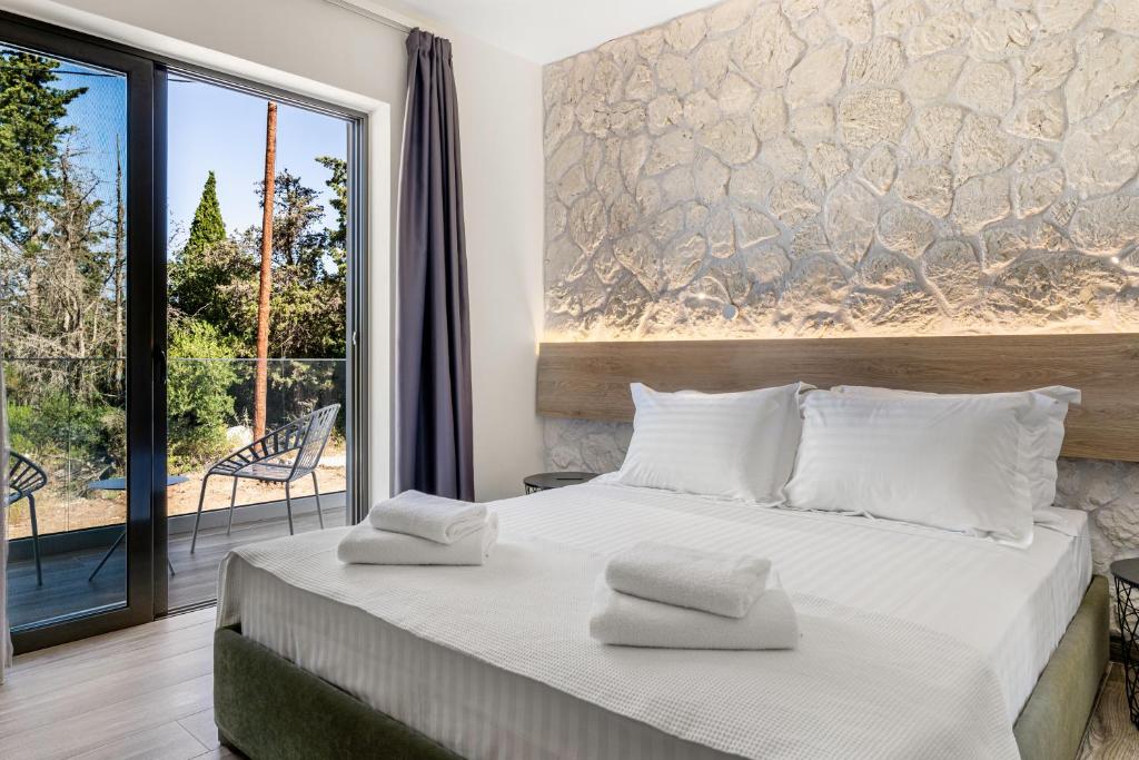Posteľ alebo postele v izbe v ubytovaní Sigma Luxury Rooms