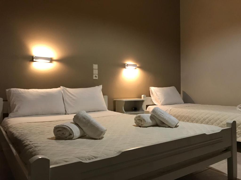 Postel nebo postele na pokoji v ubytování BelMare Studios