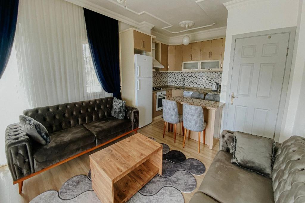 A kitchen or kitchenette at Begonvil Apart - 1