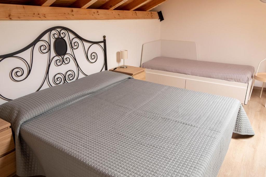 Posteľ alebo postele v izbe v ubytovaní Terre di Monacella