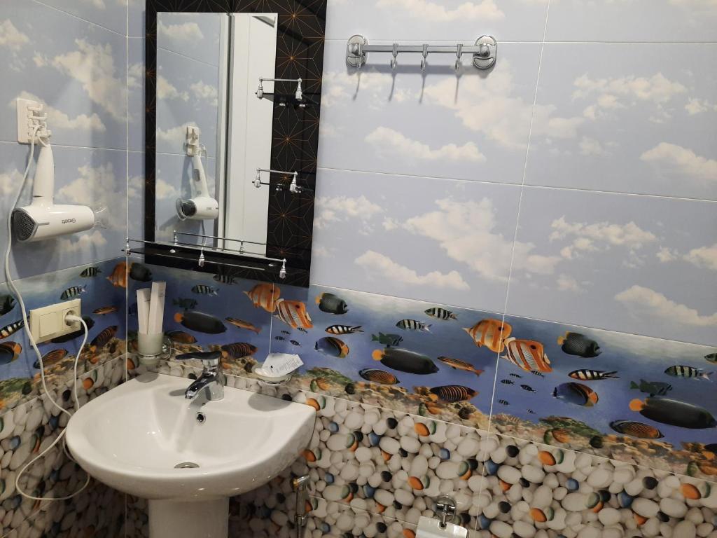 Koupelna v ubytování Hotel Goldenera