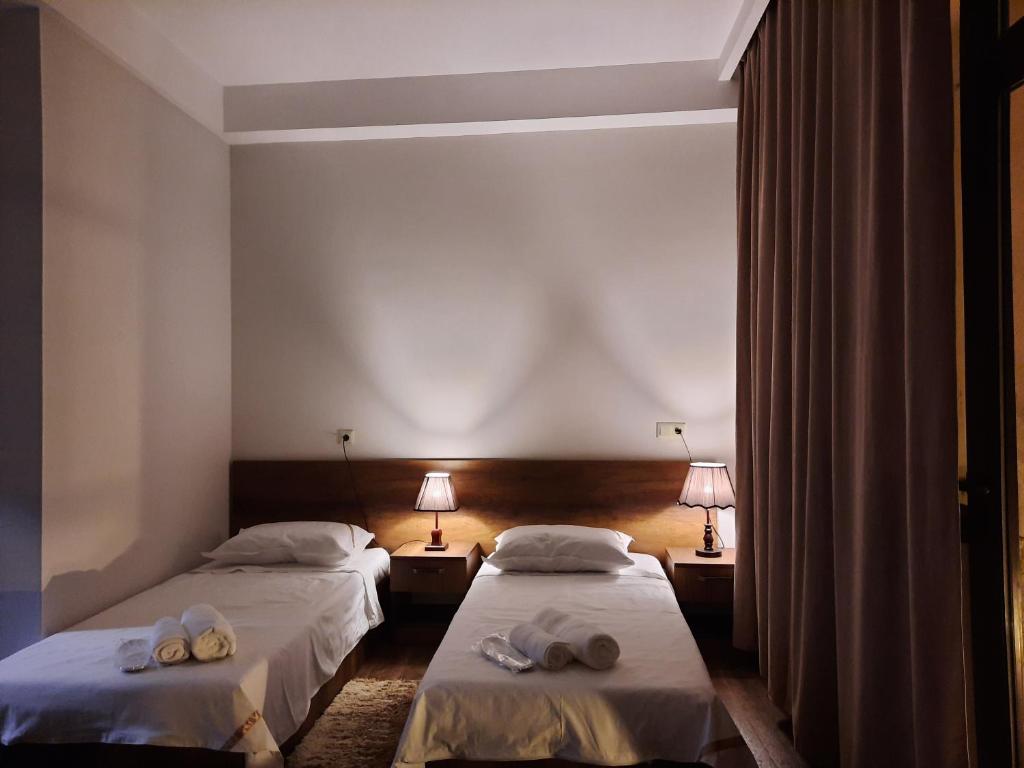 Postel nebo postele na pokoji v ubytování Hotel Goldenera