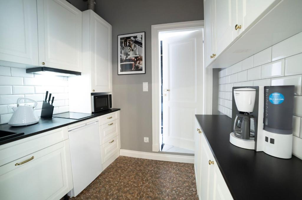 Kuchyňa alebo kuchynka v ubytovaní Sopot Haffnera Apartament