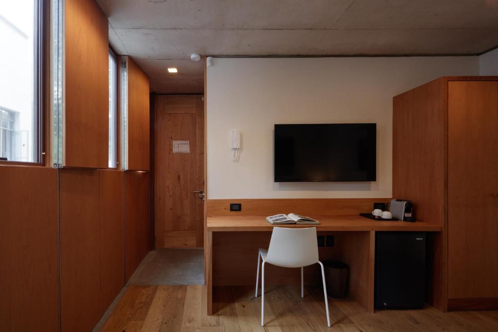 TV a/nebo společenská místnost v ubytování Casa Bosque Eduviges